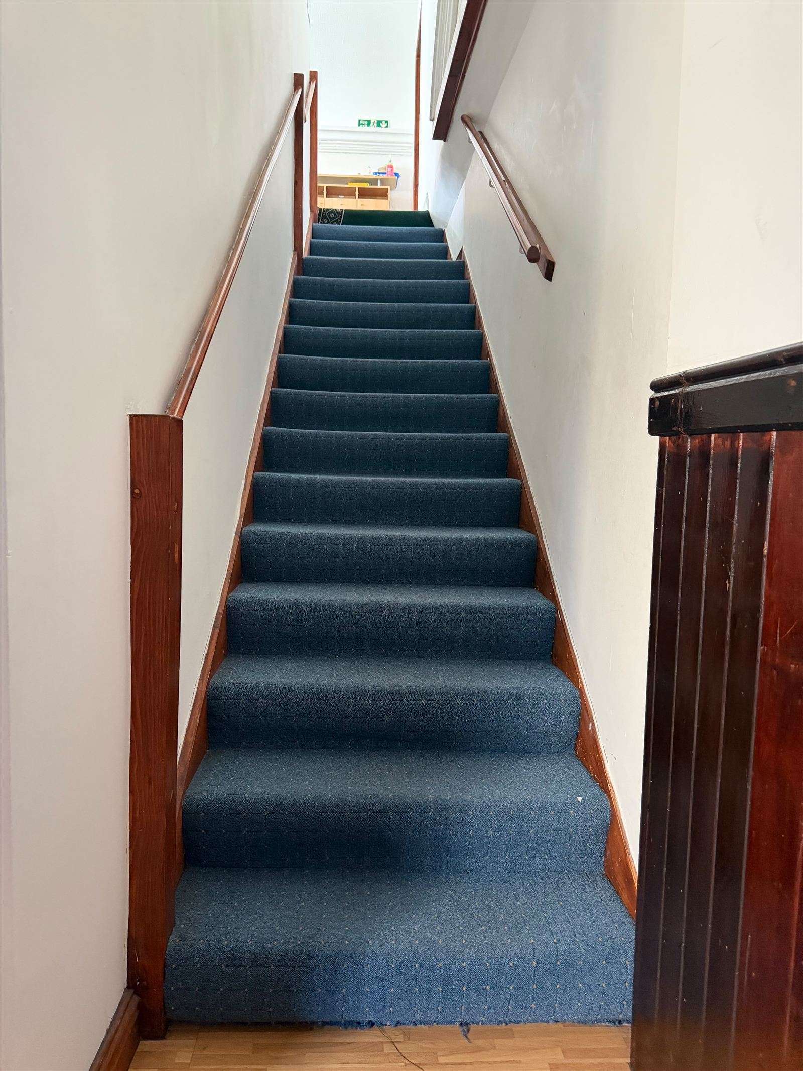 The staircase to the downstairs prayer area at Canolfan Iman Centre